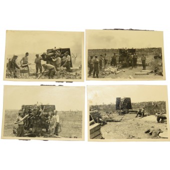 Besatzung einer 88-mm-Kanone (Flak 8,8 cm), die auf Bodenziele schießt. Espenlaub militaria
